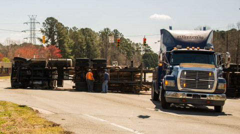 bigstock-Logging-Truck-Turned-Over-On-H-226938202